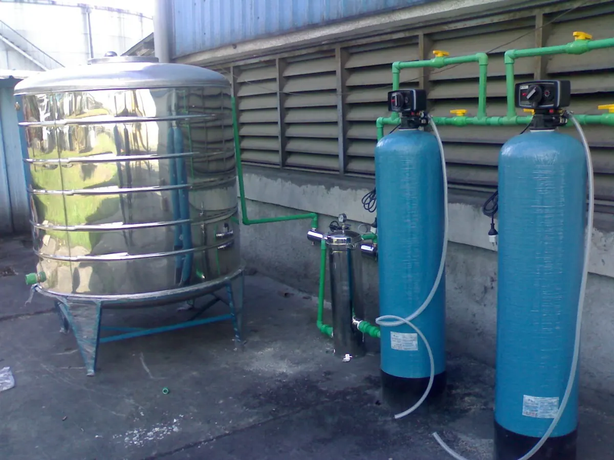 Potable water treatment unit with stainless steel storage tank at a tyre factory in Alexandria